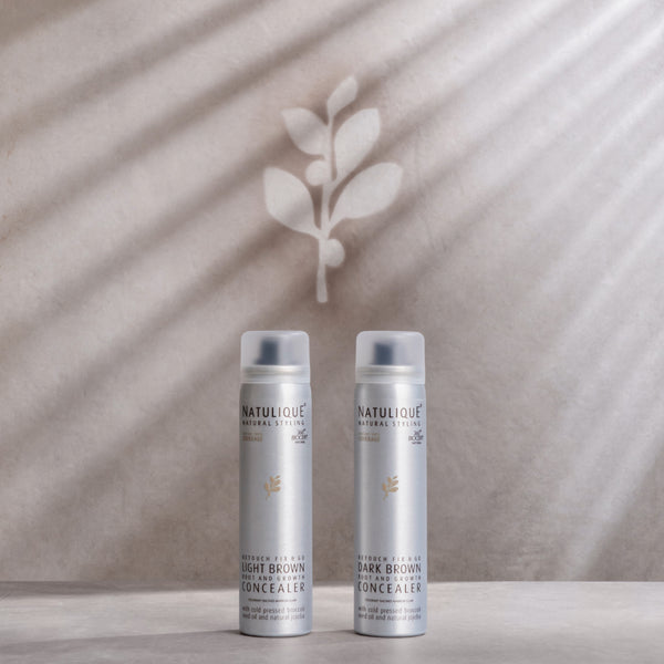 NATULIQUE organic light brown and dark brown concealer bottles on a neutral background.