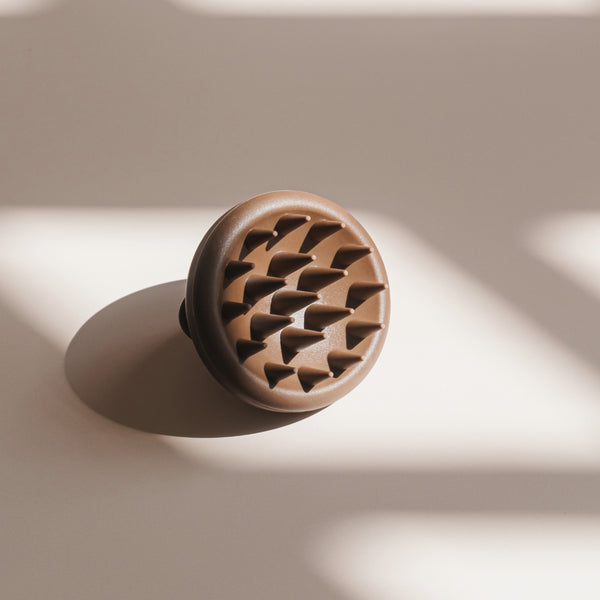 NATULIQUE Professional Scalp Brush designed for scalp massage and stimulation, enhancing hair health and relaxation.