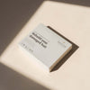 NATULIQUE Bond Repair Gift Set box with the caption 'Rebuild your damaged hair' on a neutral background.