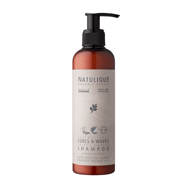 NATULIQUE ORGANIC CURLS & WAVES SHAMPOO in a brown bottle with pump, enriched with organic blueberry and aloe vera.