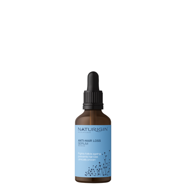 NATURIGIN Anti-Hair Loss Serum in a dropper bottle, promoting thicker and healthier hair naturally.