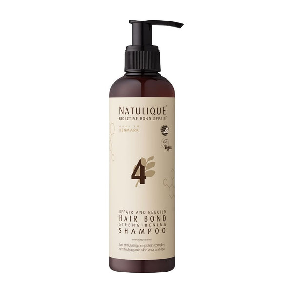 NATULIQUE ORGANIC BioActive Bond Strengthening Shampoo bottle for strengthening and hydrating damaged hair