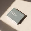 NATULIQUE Anti-Hair Loss Gift Set packaging promoting hair follicle stimulation, elegant design, luxurious gift.