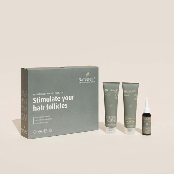 NATULIQUE Anti-Hair Loss Gift Set with shampoo, conditioner, and scalp treatment for healthy hair.