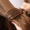 NATULIQUE Professional Wet Brush gliding through wet hair, demonstrating effective detangling and styling.