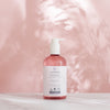LYKKEGAARD Aromatique Refreshing Hand Wash bottle with gentle pink background, highlighting nature-inspired wellness.