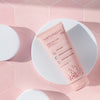 NATURIGIN Wake Up Curls Shampoo tube on pink hexagon background, ideal for soft, defined, and frizz-free curls.