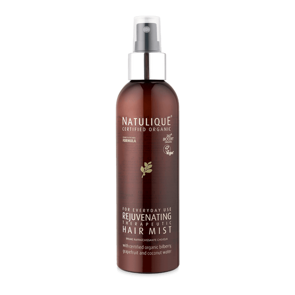NATULIQUE Organic Rejuvenating Hair Mist in a brown spray bottle, 98% organic, sustainable, professional quality care for hair.